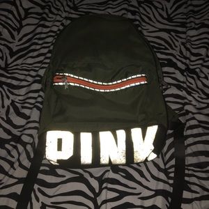 a green n orange victoria’s Secret backpack